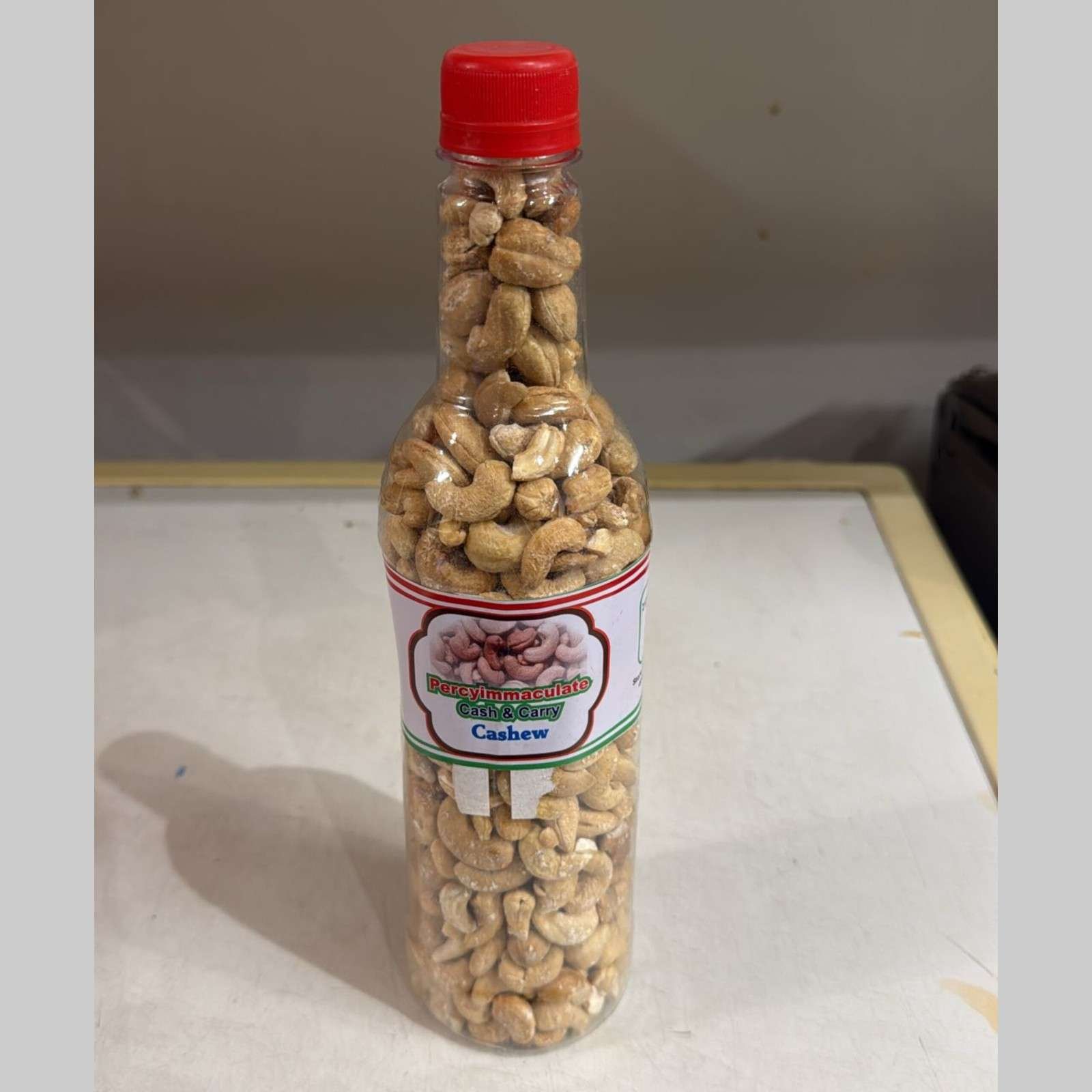 Bottled snack of roasted cashew nuts.