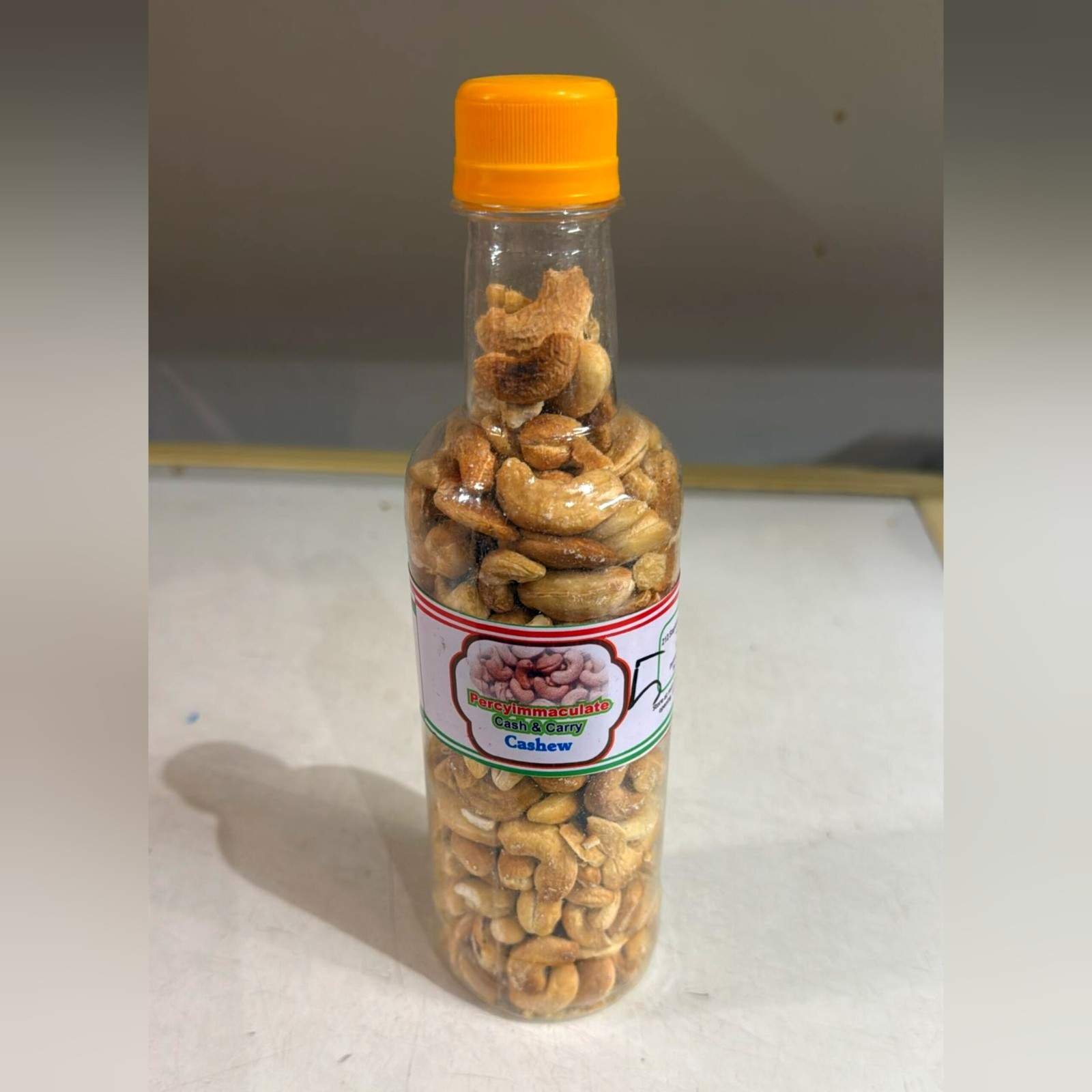 Bottled snack of roasted cashew nuts.